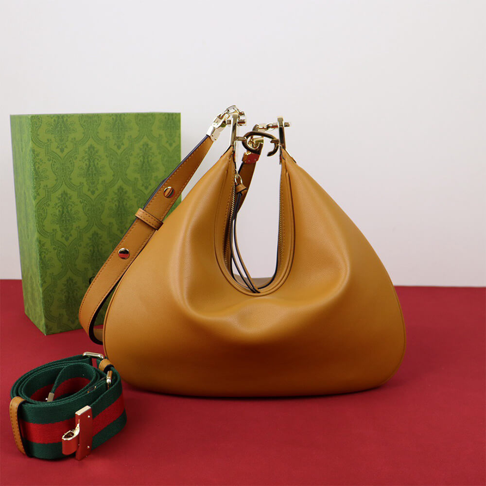 G*u*i attache large shoulder bag